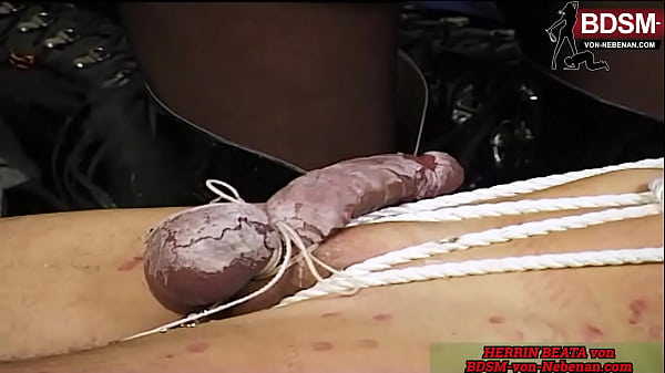 German dominatrix punishes slave with painful CBT and ties off the cock