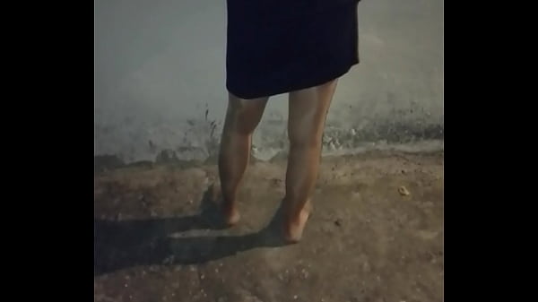 Mature woman in pantyhose and stockings is cleaning at night